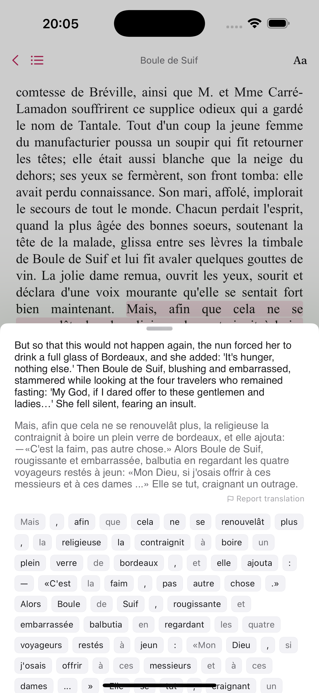 Lexico reader showing a page of Boule de Suif in French with a tapped sentence, its English translation, and every word of the sentence as a tappable chip
